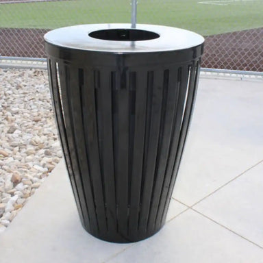 Black MyTCoat 32 Gallon Downtown Trash Receptacle Standard Unit Lifestyle Image with Baseball Field Background