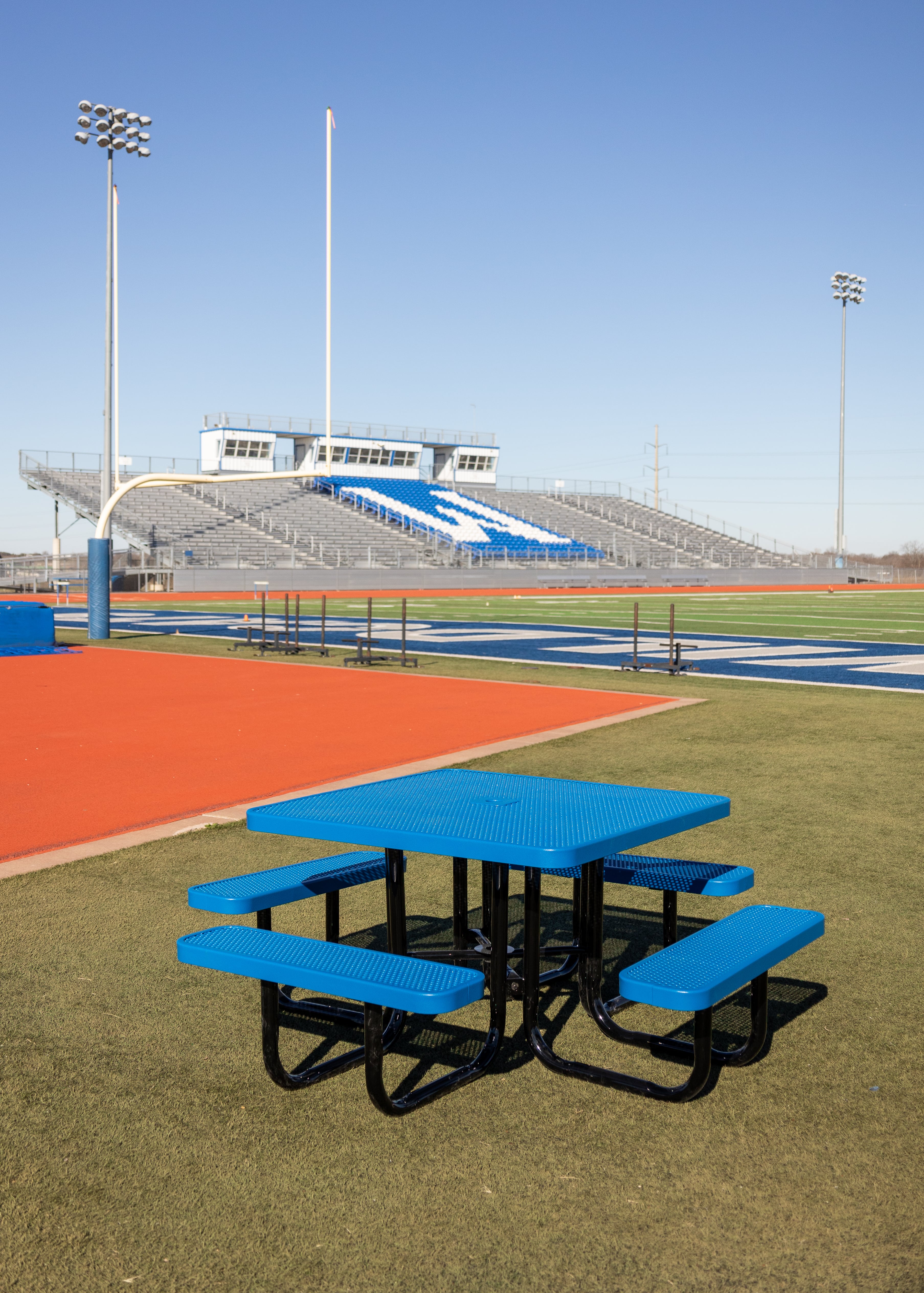 Blue MyTCoat Square Portable Picnic Tables with Football Field Background