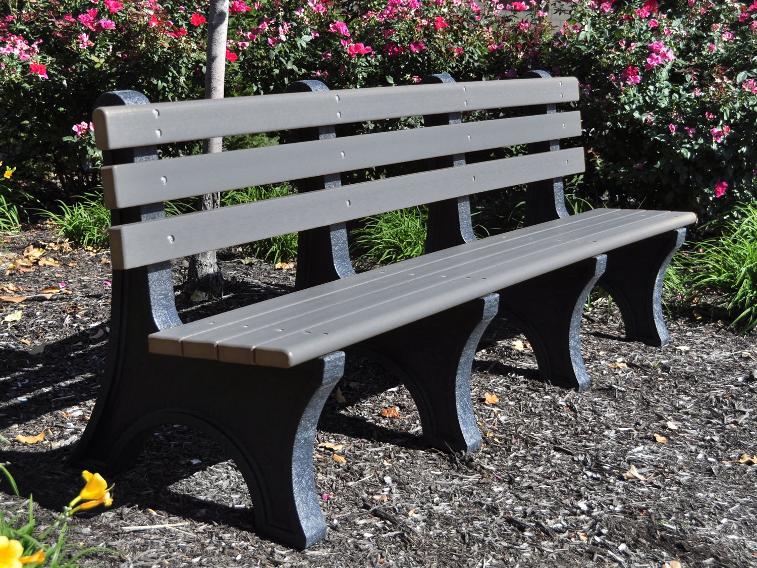 Frog Furnishings Gray Comfort Park Bench 8' Option Environmental Photo With Colorful Garden Background