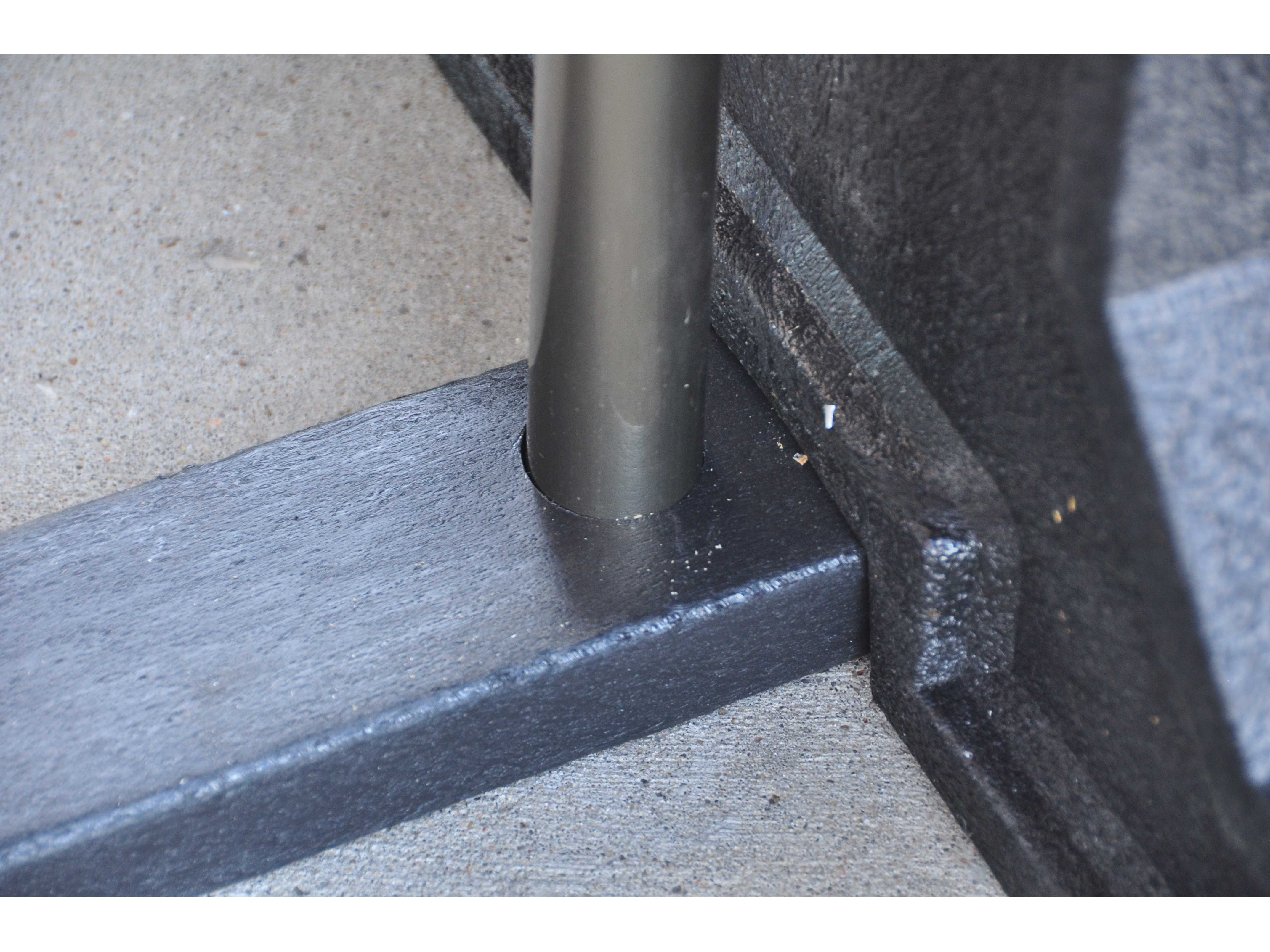 Frog Furnishings Park Place Recycled Plastic Picnic Table Umbrella Hole Close-up with Umbrella In Hole.