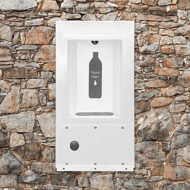 White Willoughby In-Wall Bottle Filler Front mounted on a stone wall