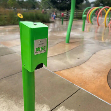 Willoughby Stainless Steel Hand Sanitizer Dispenser at a playground with WSF branding