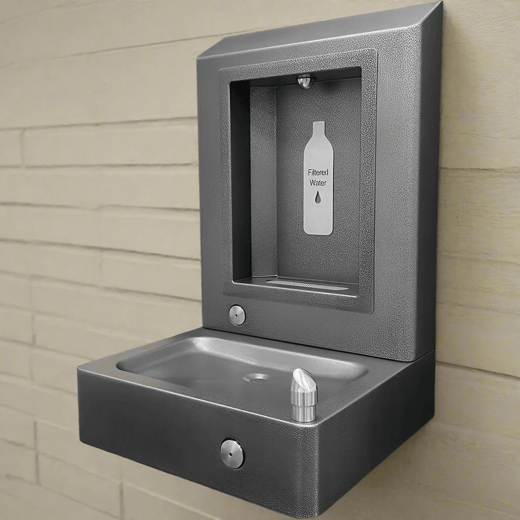 Wiloughby Stainless Wall-Mounted Bottle Filling Station with Drinking Fountain Rear Mounted with a bottle icon labeled 'Filtered Water' on a beige wall.