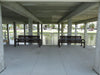 2 black Wabash Valley Contemporary Steel Benches in front of river