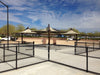 Outdoor pickleball courts with USA Shade Solana Cantilevers and a clear sky