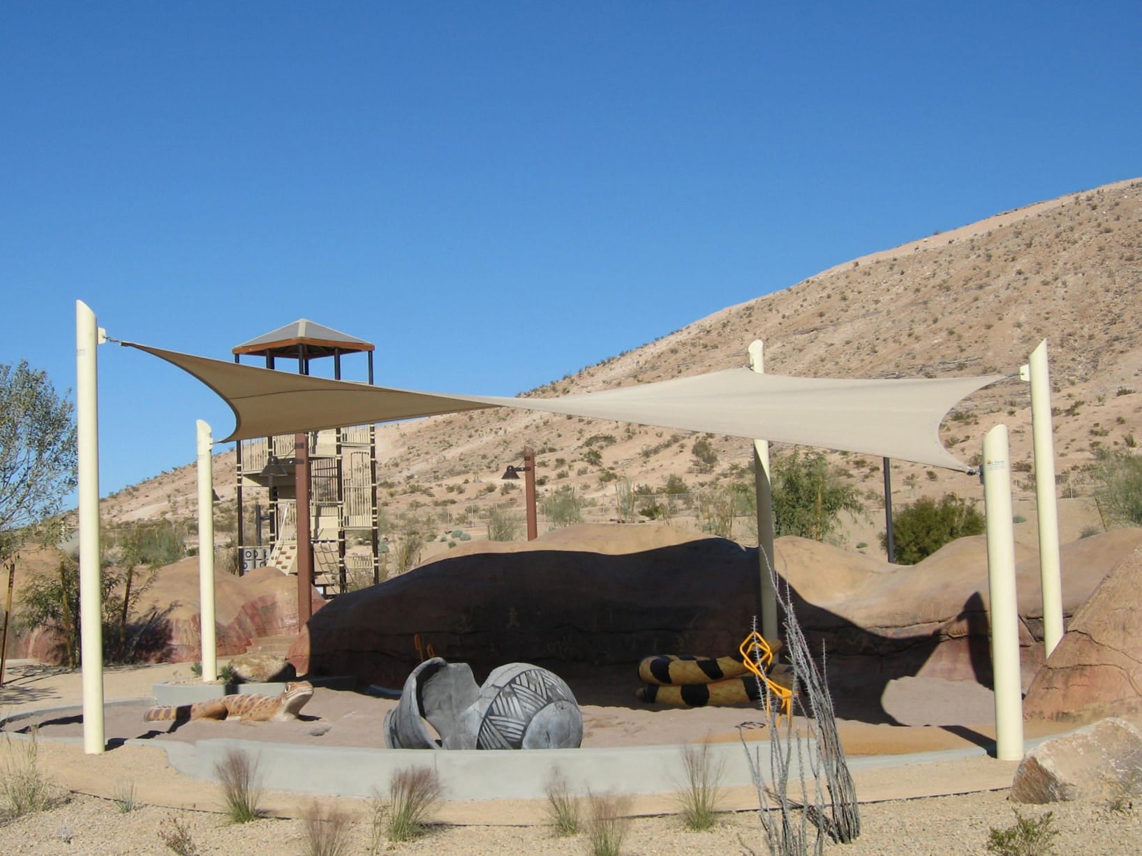 Beige USA Shade 5-Point Sail Shade in desert climate