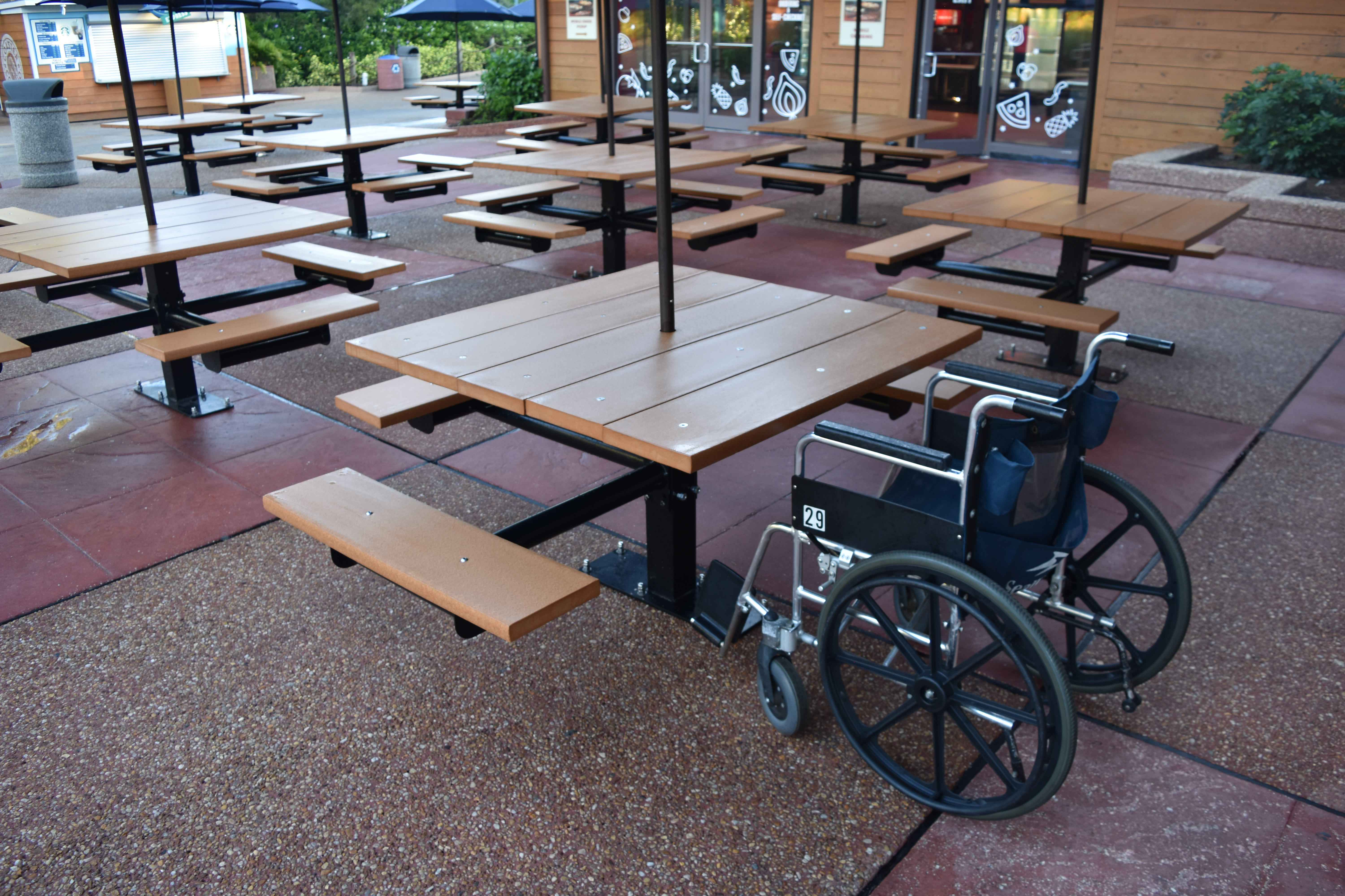 Black Wabash Valley Rinnova Square Picnic Table with 3 seats and an open wheelchair side, Surface Mount, an ada outdoor table on a patio