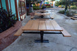 Black Wabash Valley Rinnova Square Picnic Tables with seats on two sides, Surface Mount, a row of food court tables