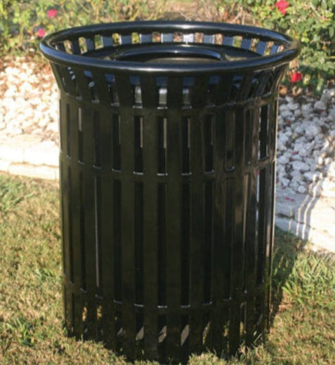 Black MyTCoat 32 Gallon Skyline Trash Receptacle Lifestyle Image Standard Unit with Pink Flower Garden Background