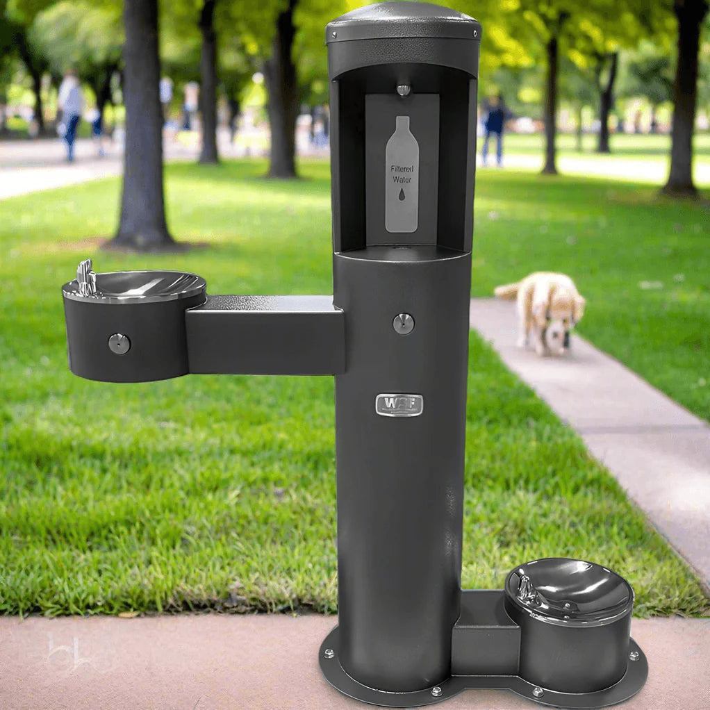 Black Willoughby Stainless Front Approach Bottle Filler Drinking Fountain in a park setting