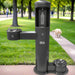 Black Willoughby Stainless Front Approach Bottle Filler Drinking Fountain in a park setting
