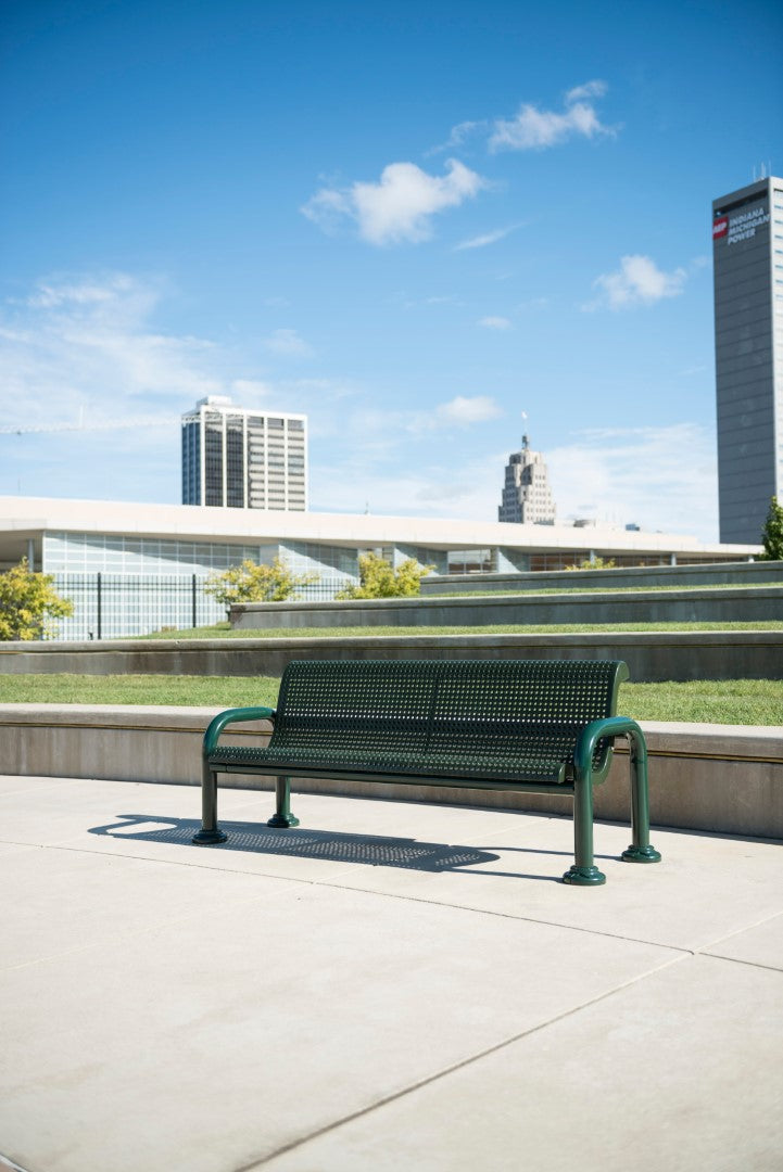 Green Wabash Valley Contemporary Perforated Steel Bench CN420P Surface Mount on a downtown civic plaza, public park bench in powder coated steel