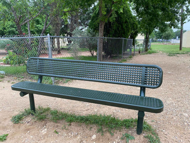 Green Wabash Valley Signature Steel Bench, Perforated seat and back, Inground legs, at an elementary school play area, commercial benches