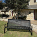 MyTCoat Metal Downtown Park Bench with Back Lifestyle Image with House and Flower Tree Background