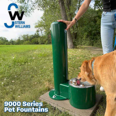Stern-Williams 9000 Outdoor Dog Drinking Fountain with a dog drinking water outdoors, Stern Williams logo visible
