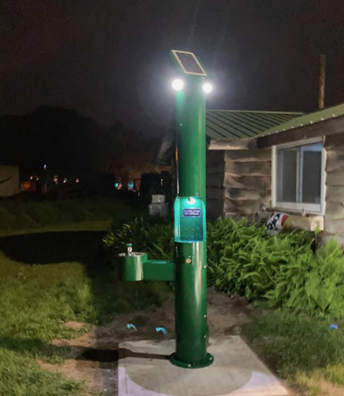 Stern-Williams Outdoor Drinking Fountain and Bottle Filler 7700 Night Time Solar Light Optional Add-On Demonstration Photo