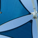 Blue Sail Shade close up detailed Image against a clear blue sky