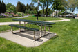 Wabash Valley Signature Portable Picnic Table with a green Diamond top on a tan frame beside a park path, vinyl coated picnic tables