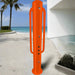 Willoughby Stainless ADA Outdoor Shower Tower on a beach with palm trees and blue sky.