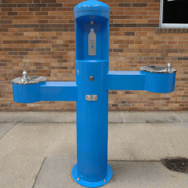 Willoughby Tri-level Drinking Fountain with Bottle Filler Side Approach with Brick Wall Background