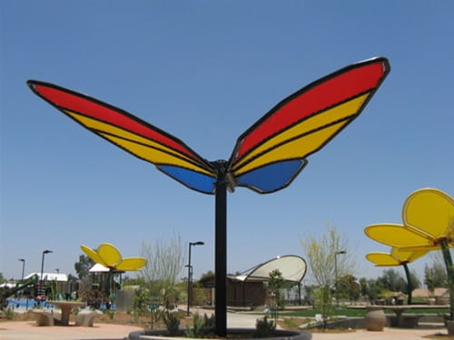 Colorful USA Shade Butterfly Wings Shade in a park setting with clear blue sky