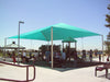 Children's playground with a Teal USA Shade Hip on a sunny day